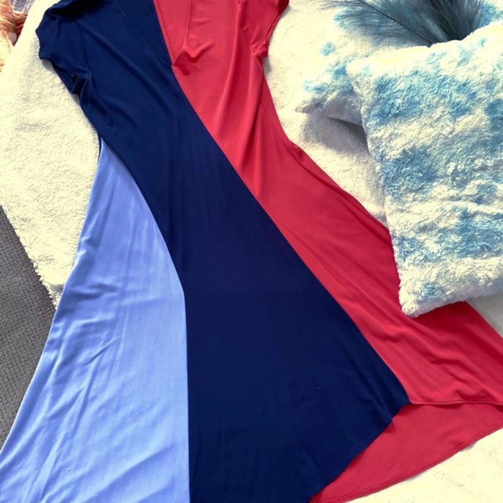 Beautiful gently worn TORY BURCH color block dress with flounce hem.